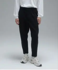 New Balance：MET24 SLIM TAPERED FIT PANTS