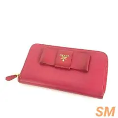 PRADA サフィアーノ ラウンドファスナー ミニリボン ピンク系 長財布