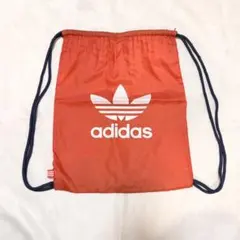adidas 赤 ドローストリングバッグ