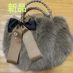 【新品】エコファー ハンドバッグ リボン付き収納良し。