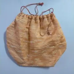 オレンジ系 巾着袋 織物