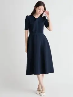 新品タグ付】TARA JARMON カジュアルタッチポロニットドレス - メルカリ
