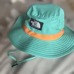 【新品未使用】THE NORTH FACE バケットハット 青/オレンジのサムネイル