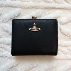 新品未使用】Vivienne Westwood 二つ折り財布 988VW706 - メルカリ