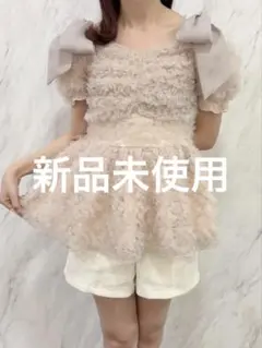 An MILLEアンミール フラワーチュールペプラムトップス An Mille アンミール フラワーチュールペプラムトップス ピンク - メルカリ