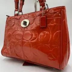 COACH トートバッグ シグネチャー ターンロック 赤 - メルカリ