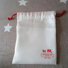 COACH ホワイト収納袋 赤い紐付き