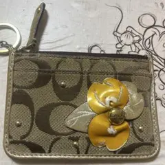 Coach コインケース 花の装飾付き