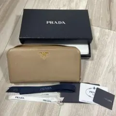 PRADA 長財布 サフィアーノ　ラウンドジップ　メタルロゴ　カメオ