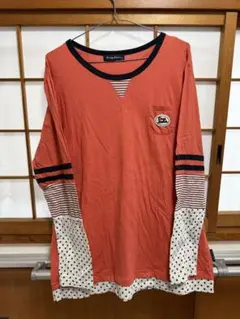 春物✨　ドラッグストアーズ　オレンジ色長袖Tシャツカットソー　袖、裾、切り替え