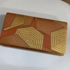 金色オレンジ色の和装用バッグ