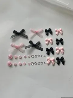 ネイルパーツ　ピンク　ブラック　リボン　ストーン