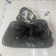 AVENCHUMU Ribbon frill kiss-lock bag - メルカリ
