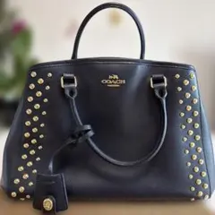 COACH スタッズ付き ハンドバッグ