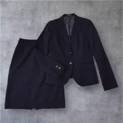 コムサイズム 黒スーツ セットアップ ジャケットSスカートM 毛100%