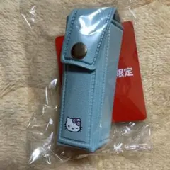 TAITO限定 ハローキティ　リップケース　リボン型チャームつき　水色