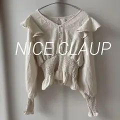 NICE CLAUP フリル付きクリーム色長袖ブラウス