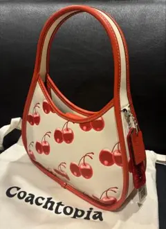 正規品】coach topia エルゴ バッグ・チェリー プリント - メルカリ