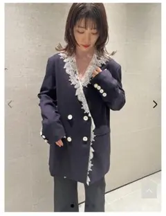 リリーブラウン　ボトルネックサムホールリブニット