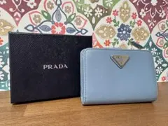 PRADA ライトブルー 二つ折り財布 箱付きのサムネイル