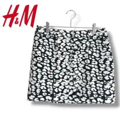 美品✨【エイチアンドエム】タイトスカート　ミニ丈　総柄　ジップアップ　綿混　黒白