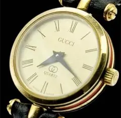 稼働 GUCCI ゴールド/ブラック クォーツ腕時計