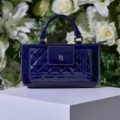 Riu Enamel Phone bag ネイビー - メルカリ