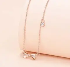 リボンネックレス　ピンクゴールドネックレス