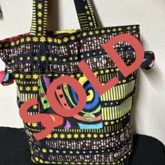 アフリカンバティックzakuchikuリバーシブル LOGO バッグ - メルカリ
