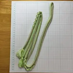 緑と白の編み込み帯締め 房付き