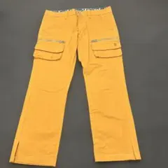 オレンジ カーゴパンツ レディース
