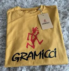 新品　タグ付　GRAMICCI グラミチ Tシャツ マスタードのサムネイル