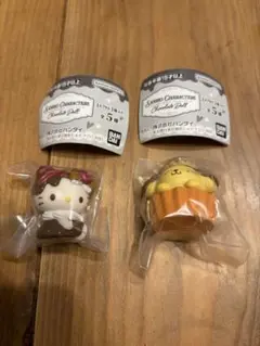 ハローキティ　ポムポムプリン　チョコレートドール　カプセルトイ 2個セット