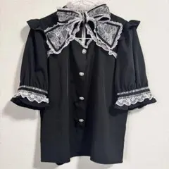 ROJITA 大きなリボンとハートボタンが特徴的な黒のブラウスのサムネイル