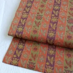 オレンジ、赤紫、黄緑の縞に鳳凰と花の模様の名古屋帯
