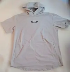 OAKLEY 半袖パーカー パフォーマンスフィット ベージュ JPN Mのサムネイル