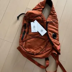 新品未使用】C.P. Company ショルダーバッグ ゴーグル オレンジ - メルカリ