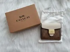 【新品・未使用】COACHコーチ二つ折り財布 ペッパーシグネチャーC7805 白のサムネイル
