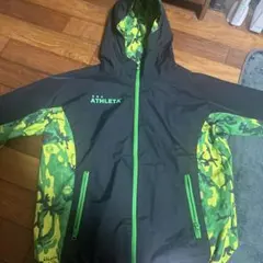 ATHLETA ピステ・ウィンドブレーカー ブラック/カモフラージュ