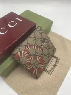 GUCCI グッチ 二つ折り財布　キングスネーク　ベージュ GGスプリーム