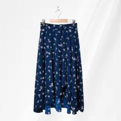 マジェスティックレゴン 花柄ヘムフレアスカート ウエストリボン ネイビー M