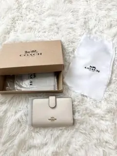 COACH 二つ折り財布