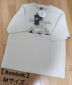 新品タグ付き Reebok グラフィックTシャツ M ベージュ 夏 UNISEXのサムネイル