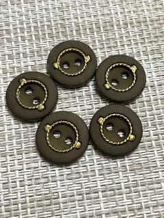 グリーンとブラウンの混ざったレトロボタン