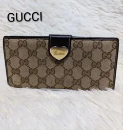 GUCCI 二つ折り財布 GGキャンバス - メルカリ