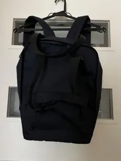 ネイビーのシンプル手さげにもなるバックパック　無印良品