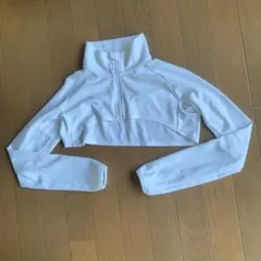 ellesse ハーフジップ クロップド丈 長袖 トップス ホワイトエレッセのサムネイル