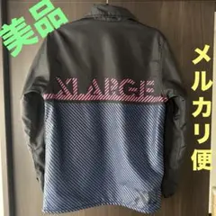 X-LARGE コーチジャケット ナイロン バッグプリント ブラック S