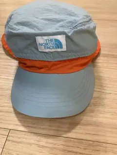 THE NORTH FACE kids日除け付きナイロンキャップ　青・オレンジ