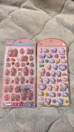 【値下中】新品 ぷっくりシール 2点セット モンチッチ コットンパフ キティー
